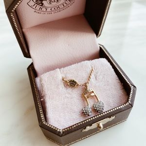 Juicy couture gold rhinestone music note necklace